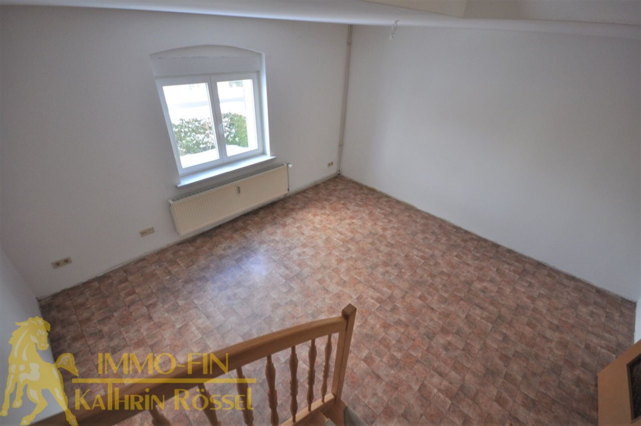 EG: Wohnzimmer mit Zugang OG